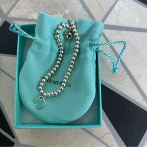 Tiffany & Co. Silver Bracelet with Blue Heart Charm